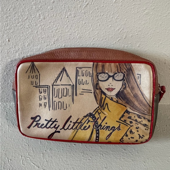 Brighton Handbags - Brighton "Pretty Little Things" cosmetic case feat. Tom Clancy's fashionista art